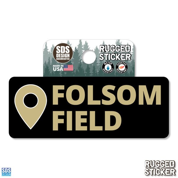 Black rugged sticker with gold location pin icon and text reading “Folsom Field.”
